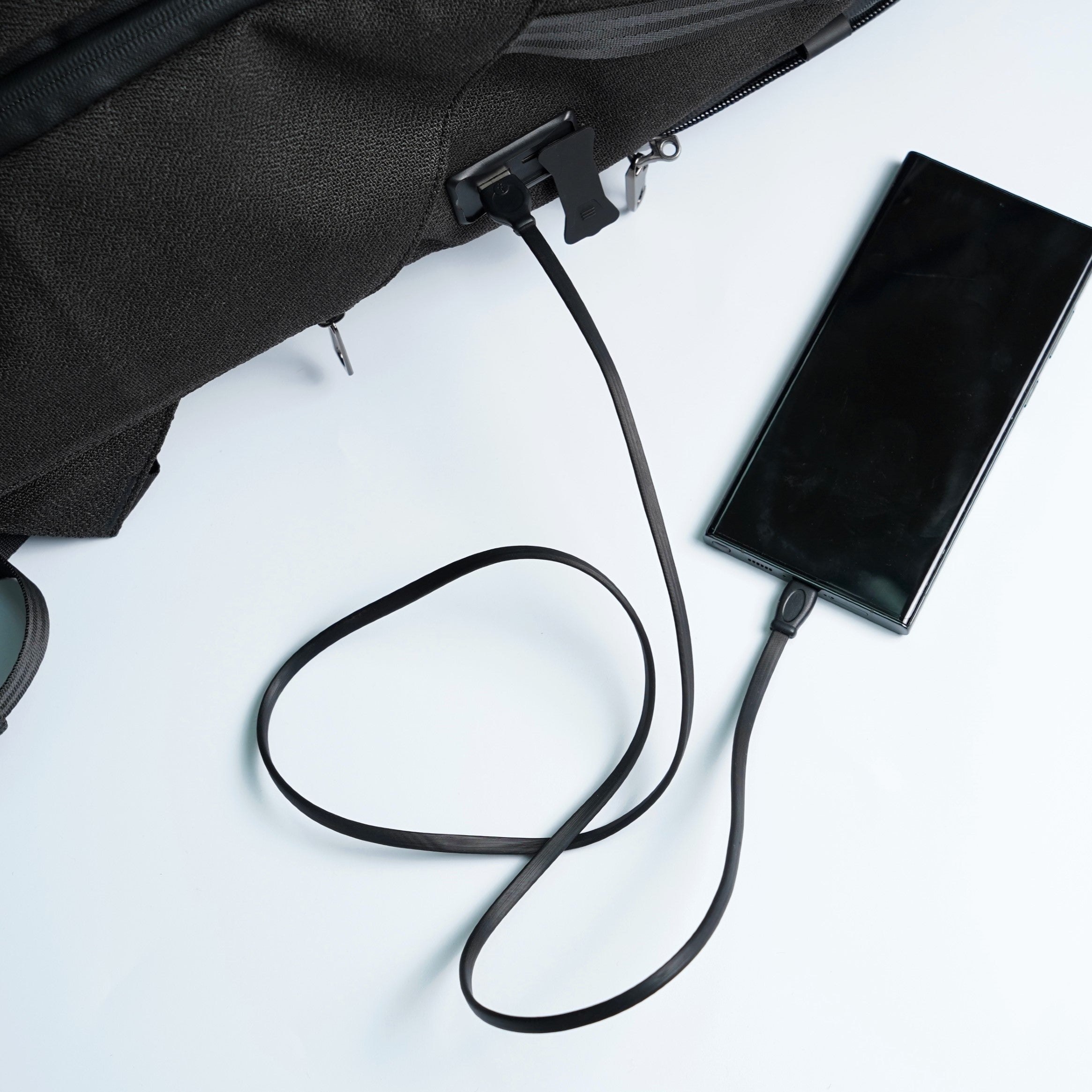 Integrated USB Type-C and USB-A charging port on ADD1D AT26 Pack V3 backpack