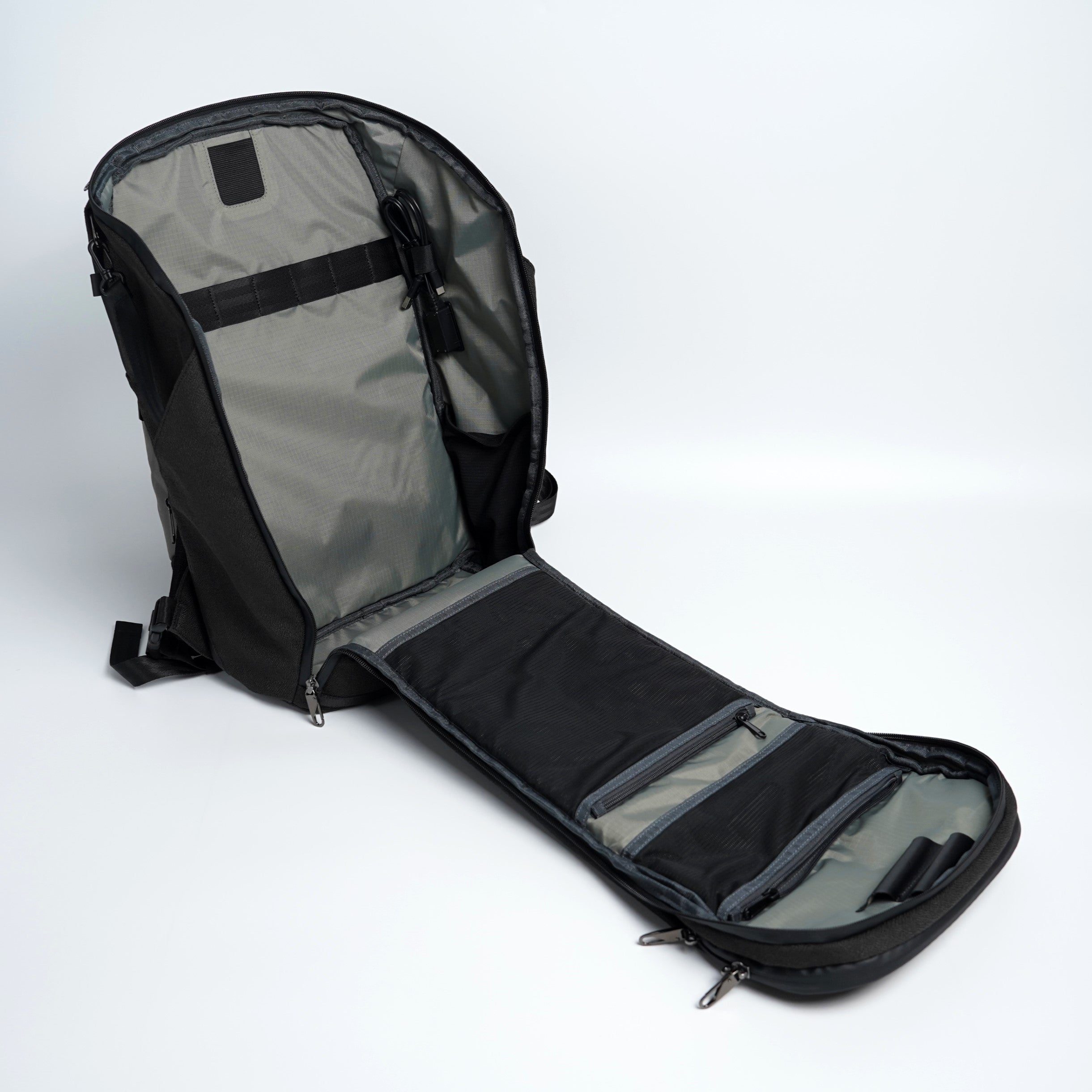 Fully opened clamshell main compartment of ADD1D AT26 Pack V3 26L travel backpack