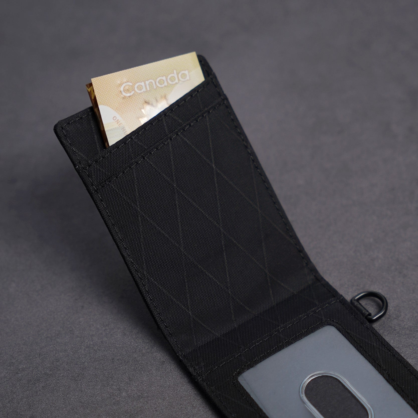 Open interior of ADD1D Bi-Fold Cardholder displaying card slots and bill compartment