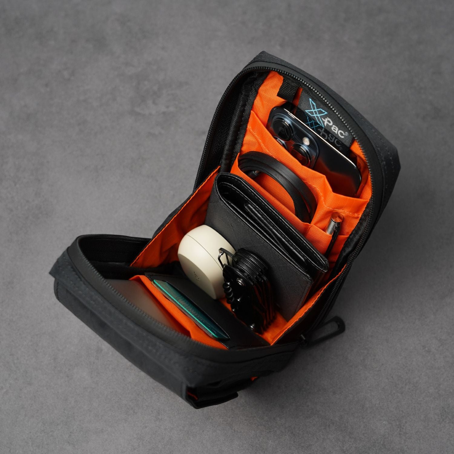 Open interior of ADD1D D2D Pouch V2 pockets for tech accessories and cables