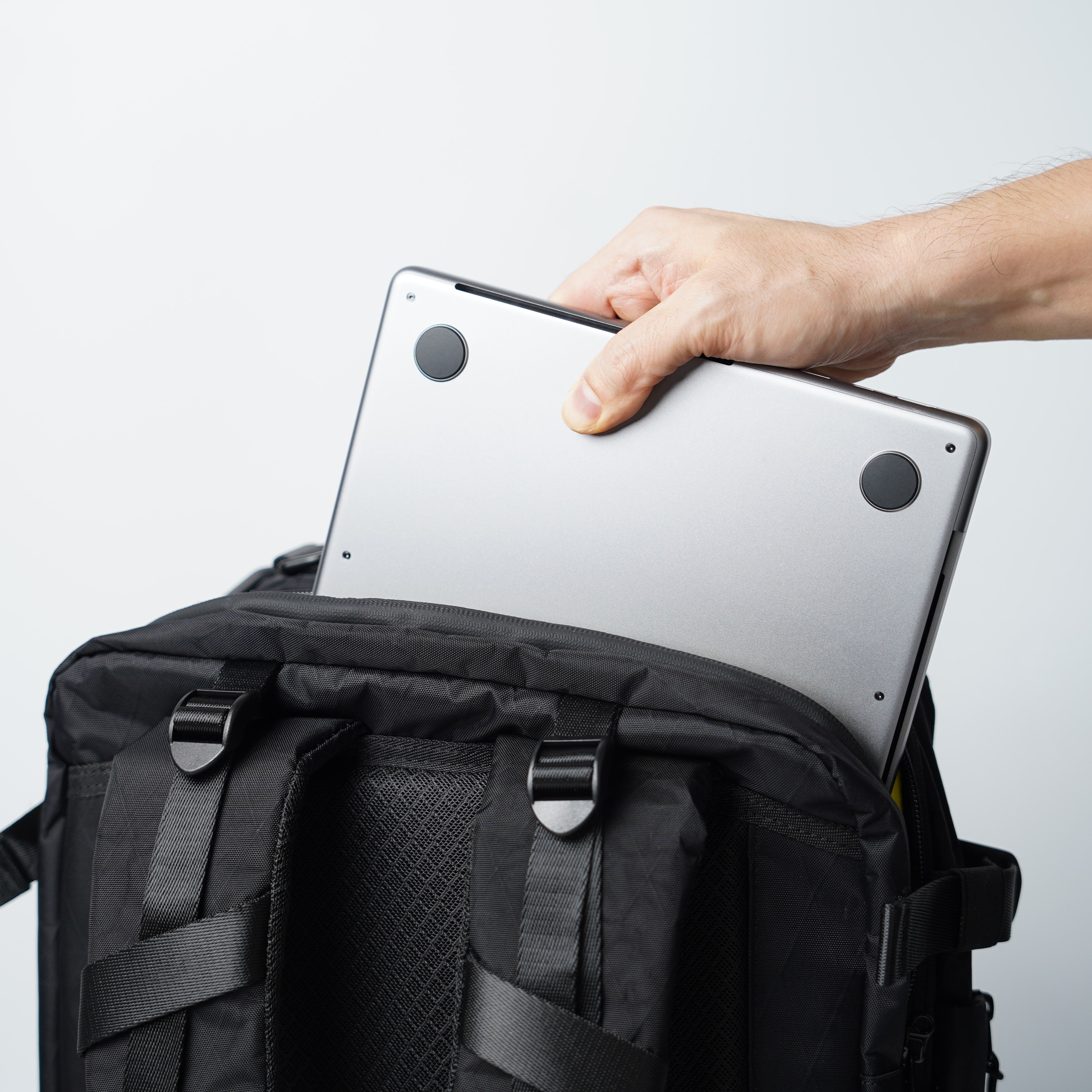 Padded tech compartment of ADD1D Explorer Pack accommodating a 16-inch laptop and tablet