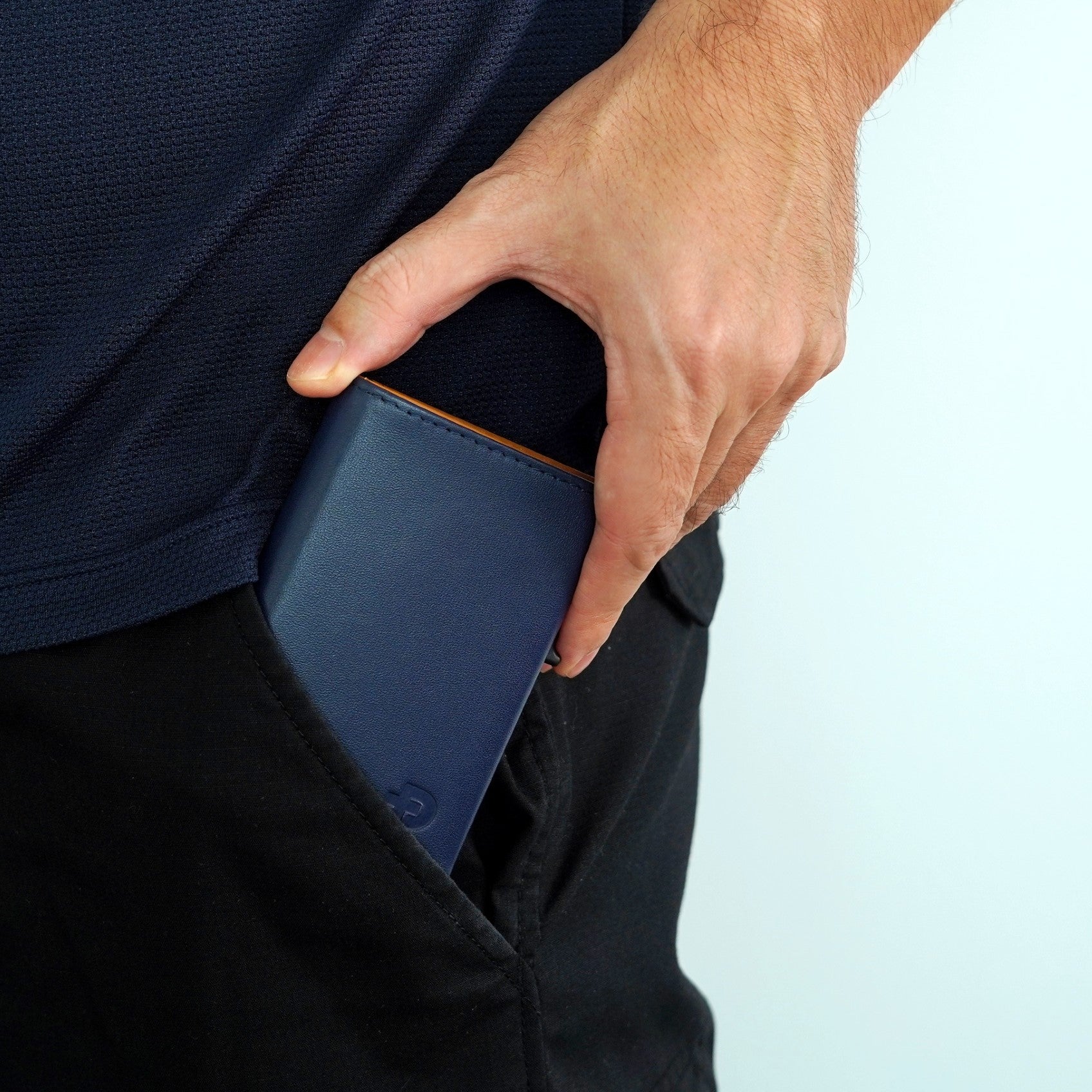 ADD1D Explorer Wallet Leather Edition held in hand showing sleek everyday carry pocket fit