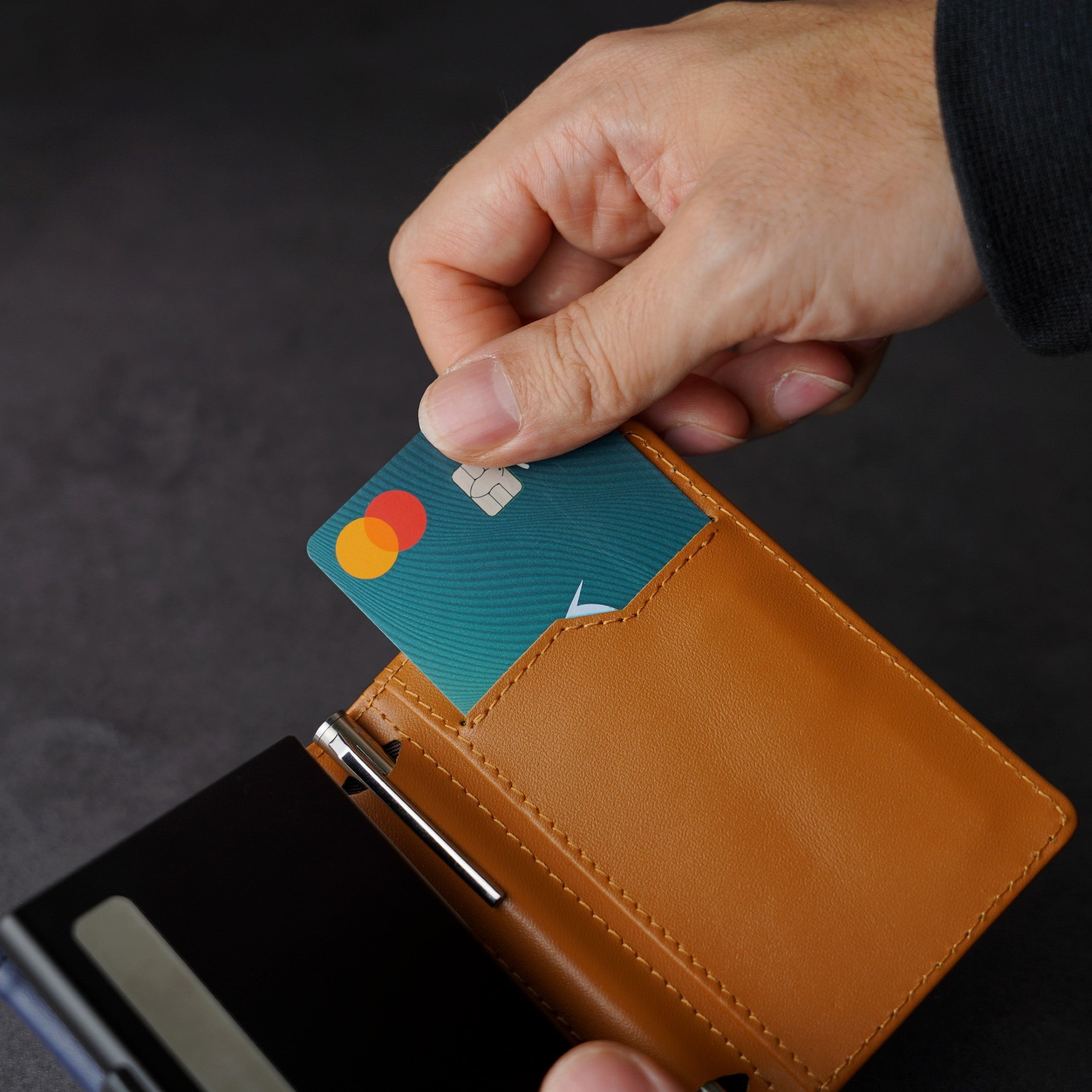 Open interior of ADD1D Explorer Wallet Leather Edition displaying credit card slots and folded cash pocket
