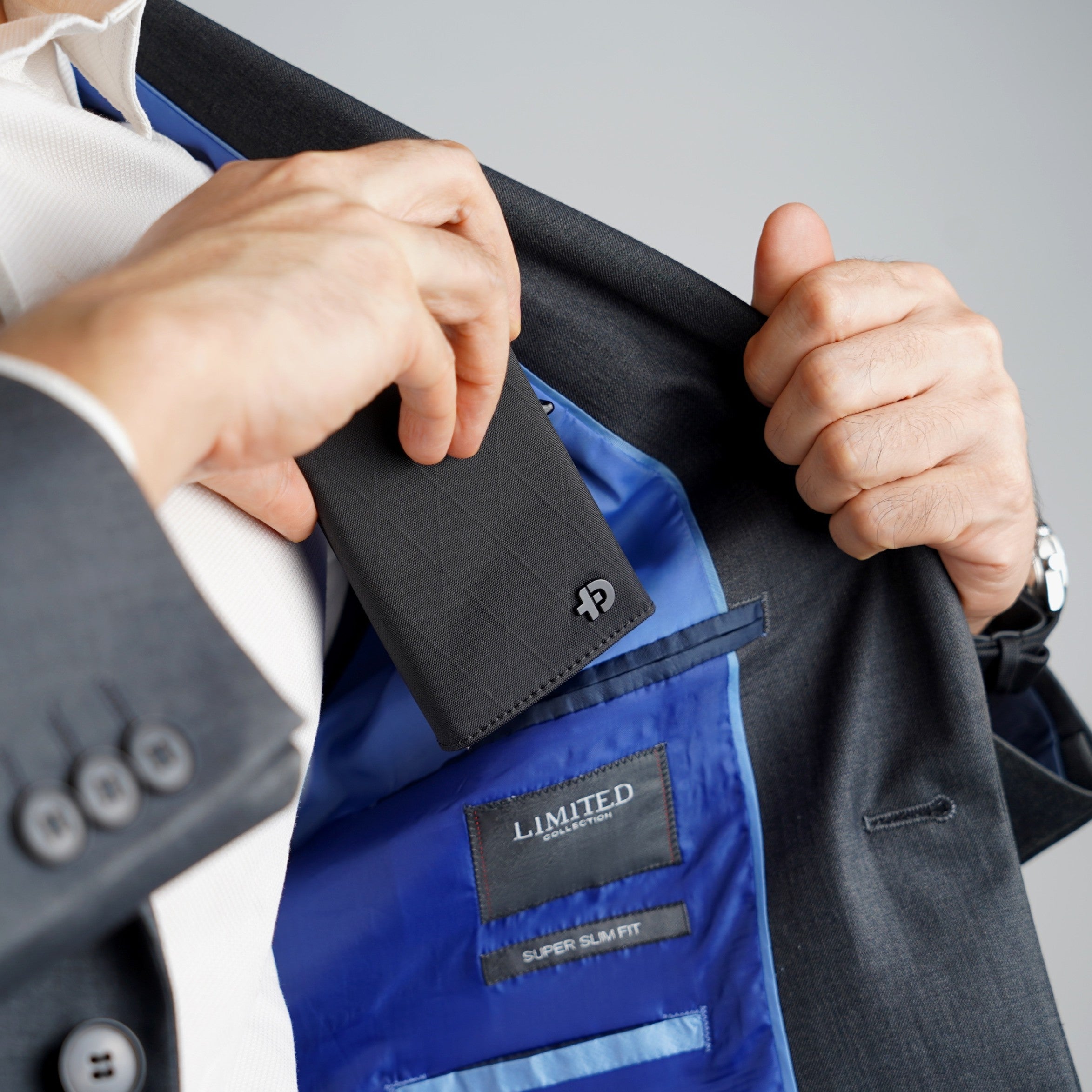 ADD1D Explorer Wallet held in hand showing ultra-compact pocket-friendly size