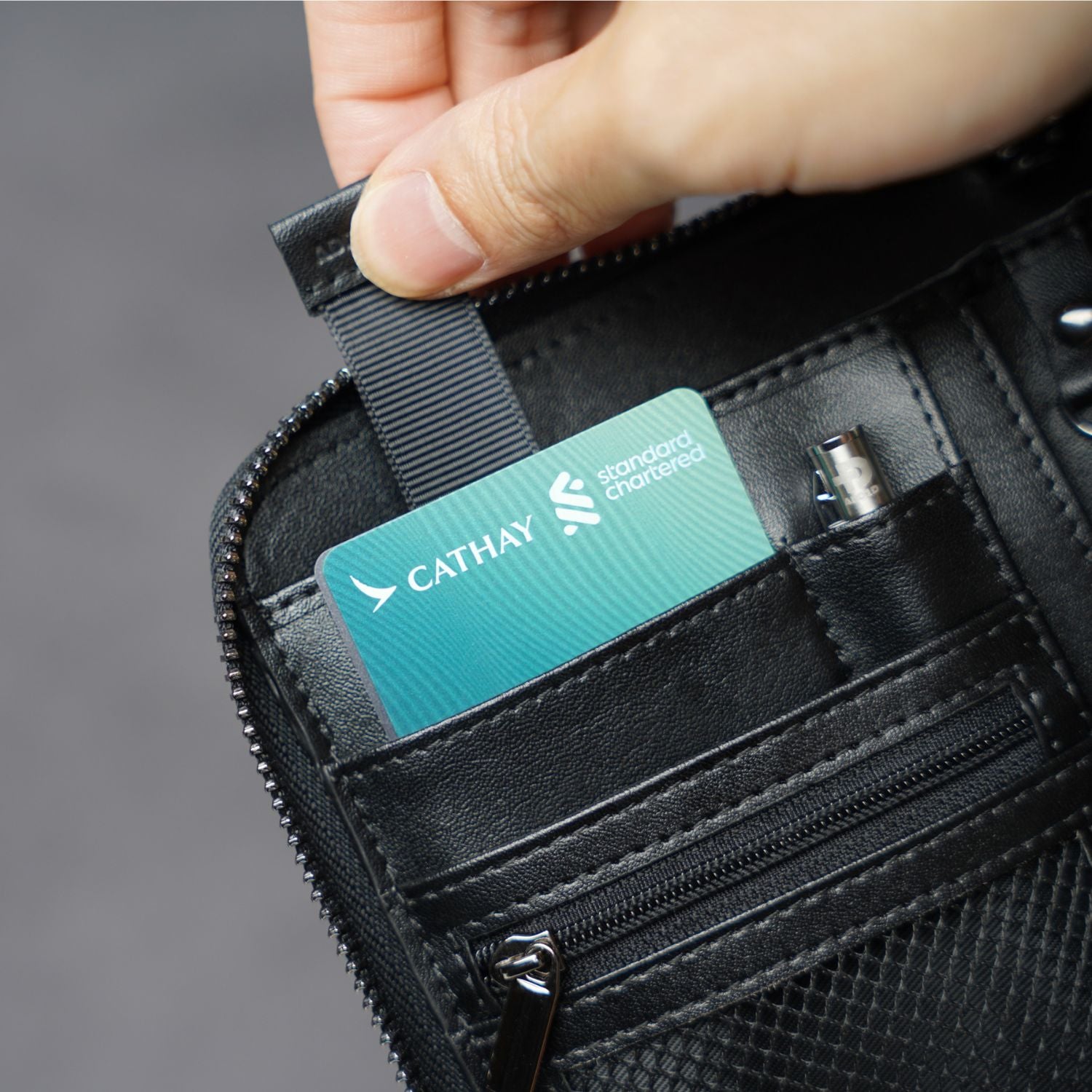 Dedicated tech slots inside ADD1D Explorer Wallet T for SIM cards, SD cards, and SIM eject tool