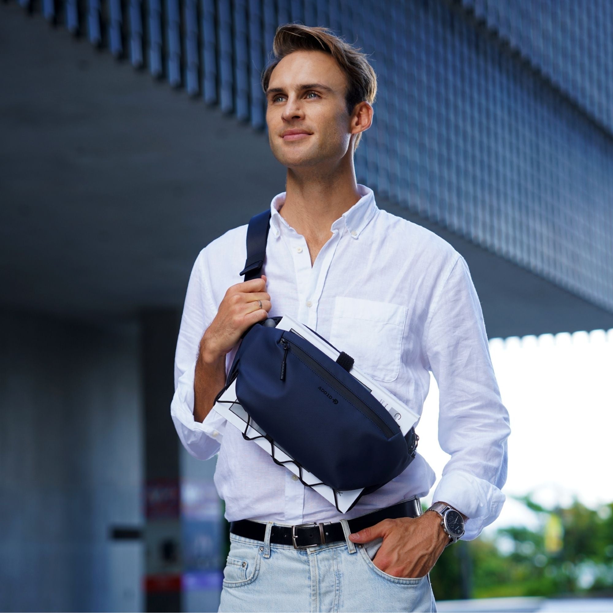 Model wearing the ADD1D Kangaroo Sling as an urban EDC crossbody bag