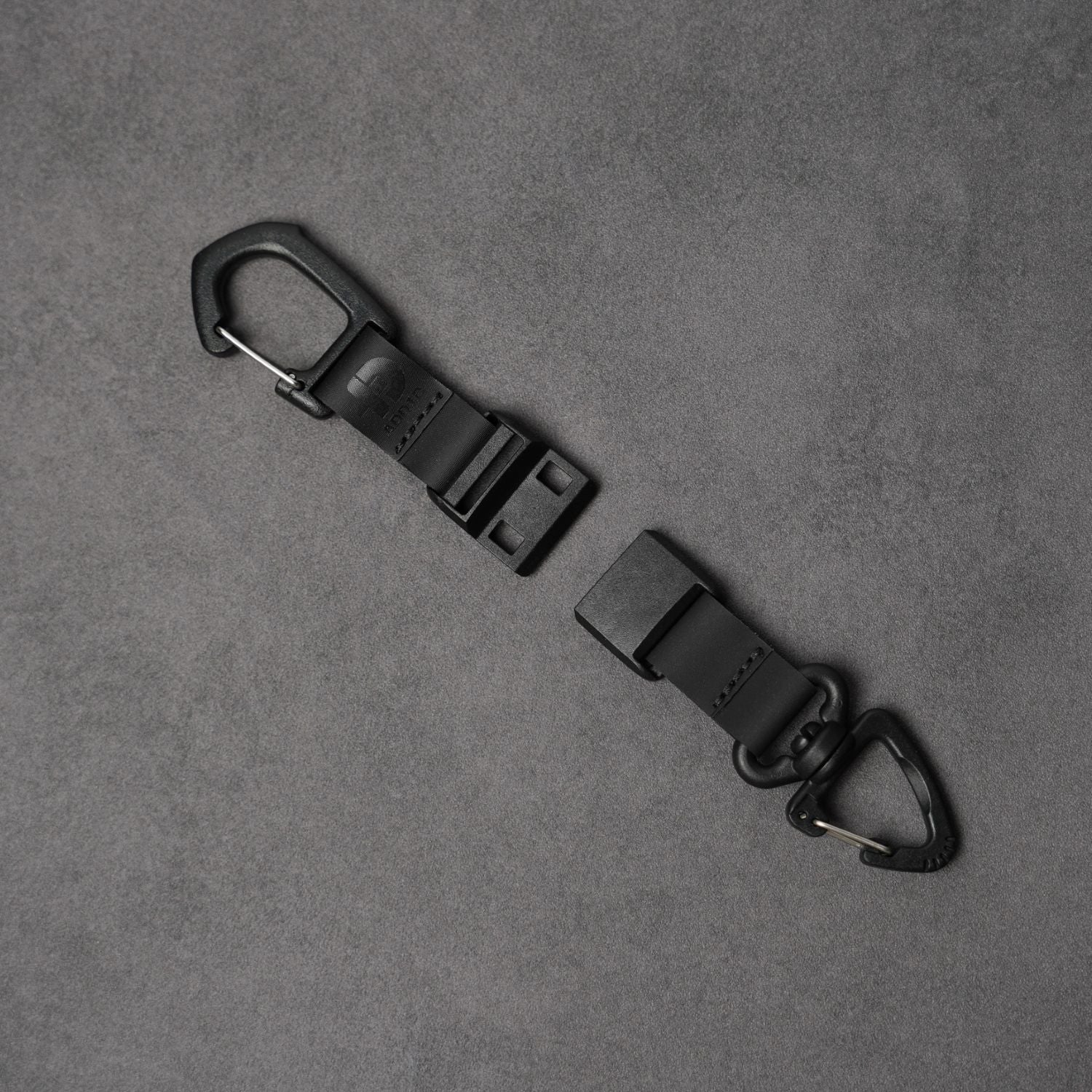 Close-up of quick-release magnetic latch mechanism separating on ADD1D Magnetic Keychain